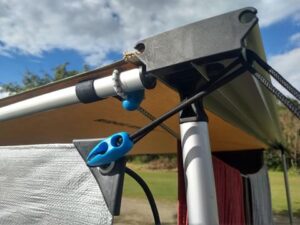 Adjustable bungee tie down caravan annex side